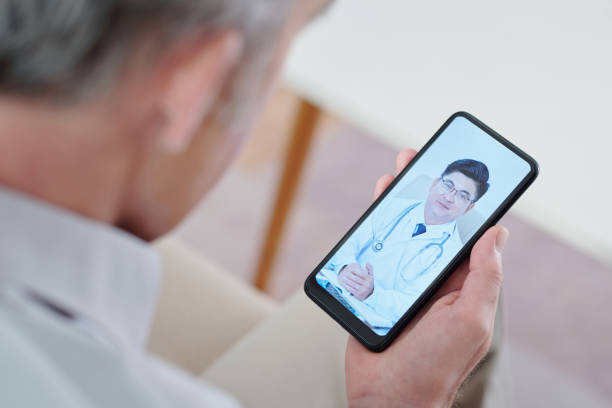 istock Senior Man Video Calling Cardiologist 1352168893