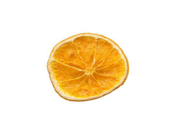 istock A piece of dried orange isolated on a white background. 1352170167