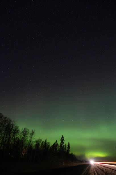 istock Northern Lights Captured from the road. 1352171052