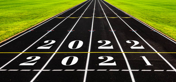 istock Year 2021 and 2022 on running track. New year concept. 1352171149