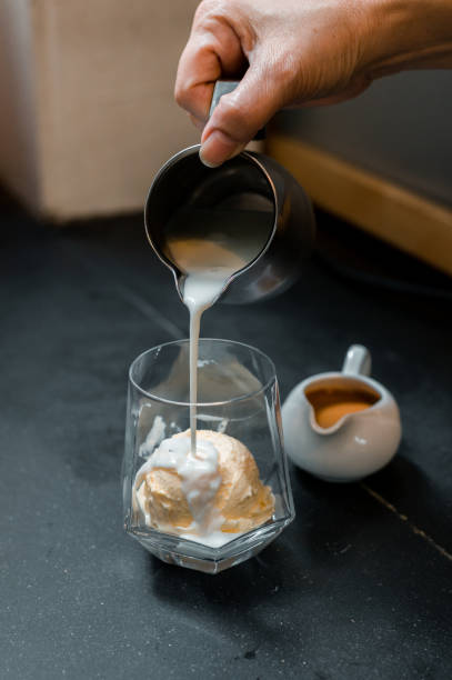 istock Glass of coffee on the table 1352171232