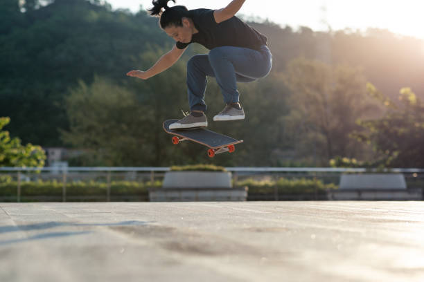 istock Skateboarder skateboarding outdoors in city 1352171244
