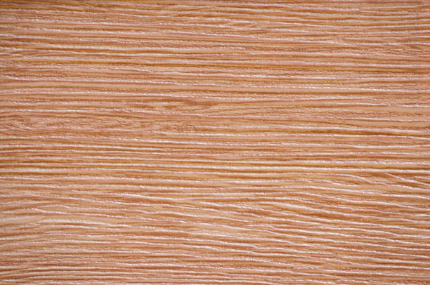 istock Light cherry flat surface of natural red wood with striped pattern close-up. 1352174434