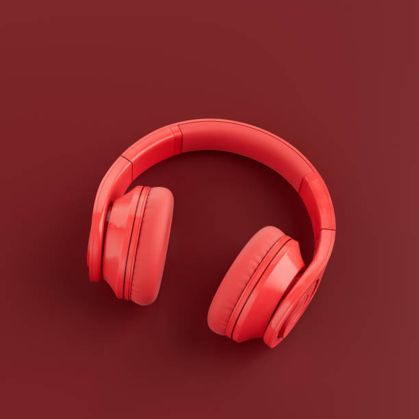 istock Monochrome red color over ear headphone in a red studio, top view,3d rendering 1352181873