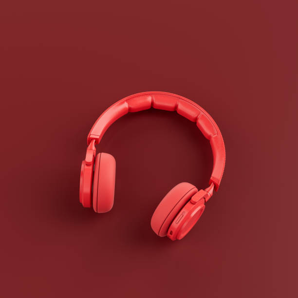 istock Monochrome red color over ear headphone in a red studio, top view,3d rendering 1352182463