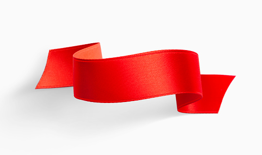 Red ribbon banner isolated on white background.