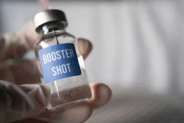 Booster shot covid-19 vaccine concept