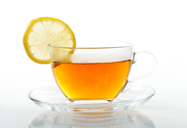 istock Tea cup with slice of  lemon 135219424