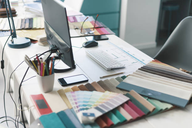 istock Interior designer work desktop with fabric swatches 1352194878