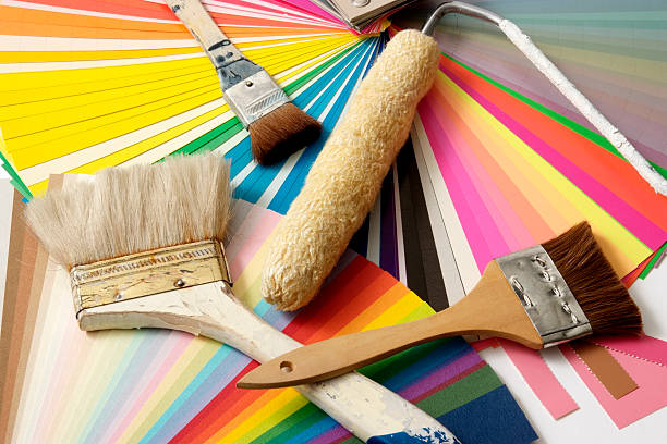 istock Close-up of paint brushes, roller,and color samples 135219524