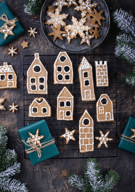 istock Christmas cookies in shape of gingerbread house 1352201775