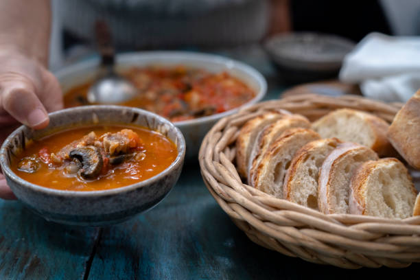 istock homemade meal:  sliced baguette and stewed beef with tomato sauce 1352204334