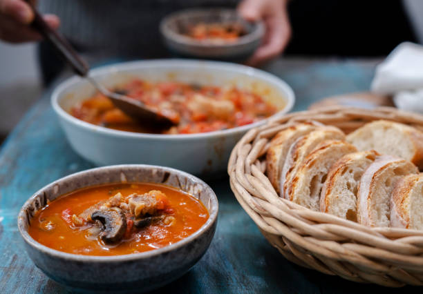 istock homemade meal:  sliced baguette and stewed beef with tomato sauce 1352204338