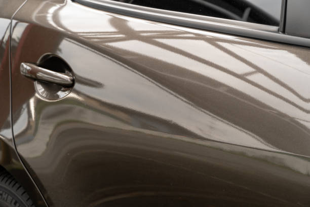 istock Brown car rear door with door handle There is a shadow until you can see the reflection 1352204797