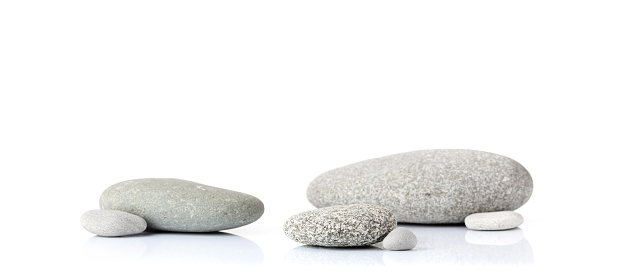 Pebble stones for podium or platform. Mock up for display your product. With copy space. Isolated on white background