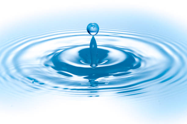 istock drop of water with rippled 1352208498