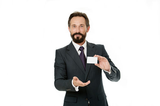 Businessman carries business card. Feel free to call me anytime. Businessman hold plastic blank white card copy space. Call this number. Contact for cooperation. Man offer phone support line.