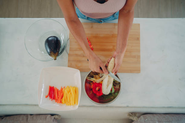 istock Putting aside food waste to make a compost 1352213431