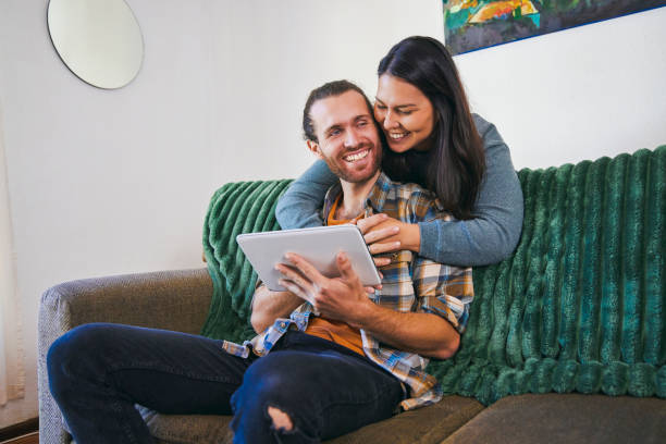 istock Shot of a young couple using their digital tablet together 1352216295