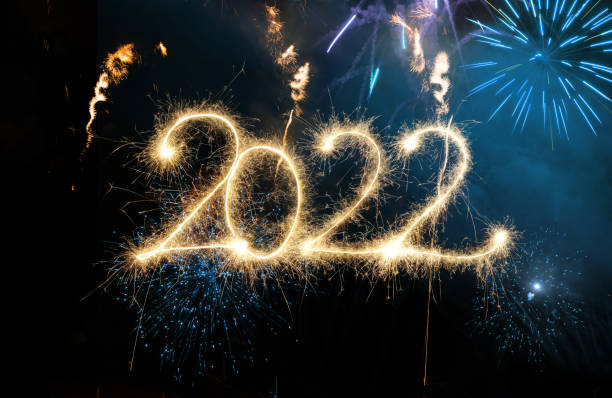 istock Sparkler Happy New Year 2022 With Fireworks 1352229234