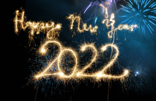 istock Sparkler Happy New Year 2022 With Fireworks 1352231556