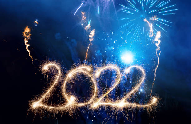 istock Sparkler Happy New Year 2022 With Fireworks 1352231866