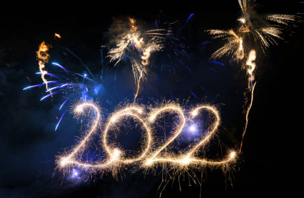 istock Sparkler Happy New Year 2022 With Fireworks 1352231975
