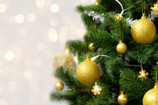 istock Christmas Tree with blurred light background, Holiday concepts 1352232014