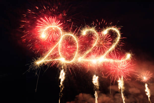 istock Sparkler Happy New Year 2022 With Fireworks 1352232107