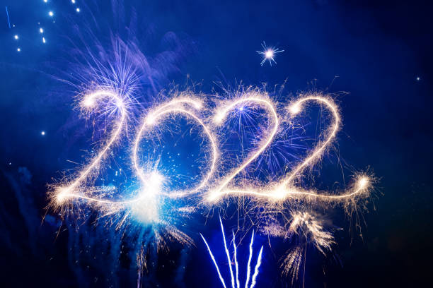 istock Sparkler Happy New Year 2022 With Fireworks 1352232249