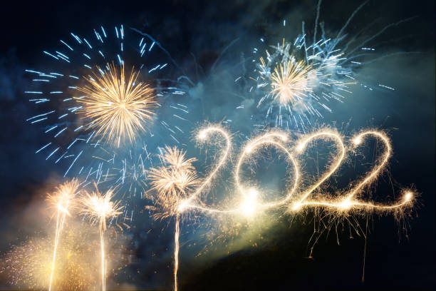 istock Sparkler Happy New Year 2022 With Fireworks 1352233055