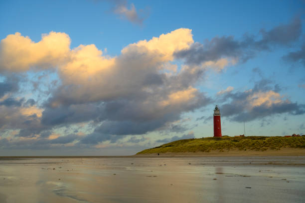 istock Texel lighthouse in the dunes during a stormy autumn evening 1352233109