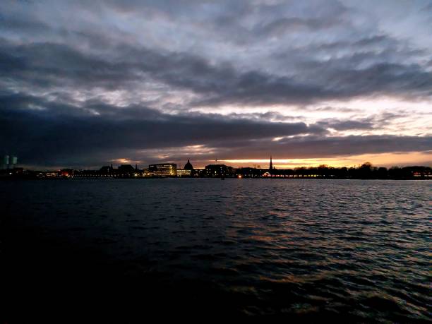 istock Sunset over water in Copenhagen 1352234306