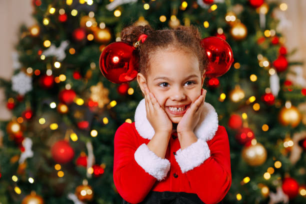 istock a black child is surprised by miracles at Christmas 1352234354
