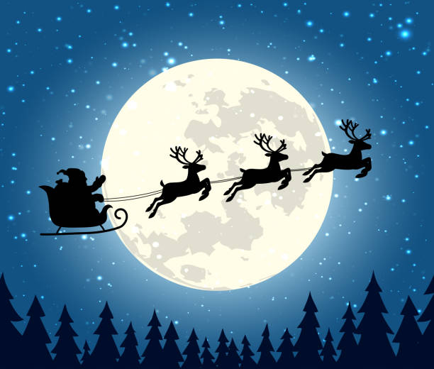 istock Silhouette Santa Claus rides a sleigh with reindeer 1352234454