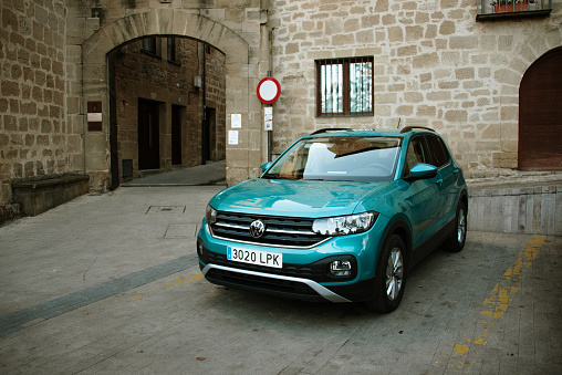 Laguardia, Spain - 24 October 2021: Front view of a turquoise colored Volkswagen T-Cross