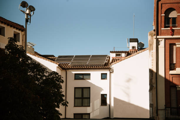 Solar panels on a rooftop stock photo