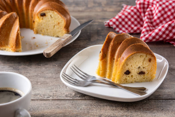 istock Traditional bundt cake piece with raisins 1352245012