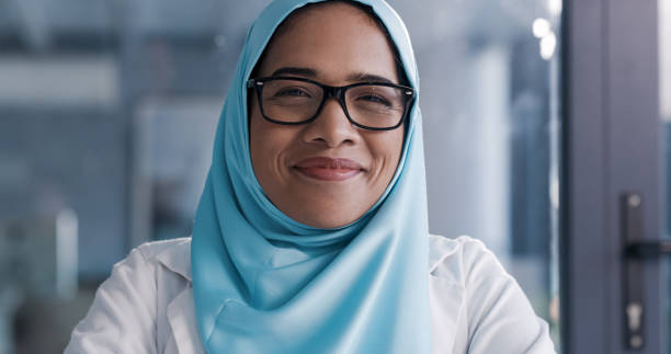 Shot of a young female doctor in an office at work stock photo