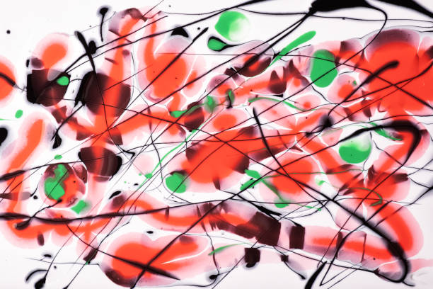istock Black and red lines and splashes drawn on white background. Abstract art spotted backdrop with green brush stroke 1352247834