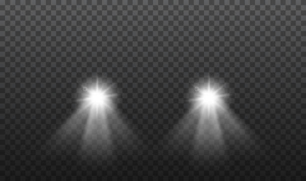 auto leuchtende lichtlampen auf isoliertem hintergrund. vektor - autoscheinwerfer stock-grafiken, -clipart, -cartoons und -symbole