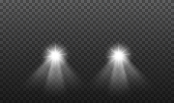 ilustrações, clipart, desenhos animados e ícones de lâmpadas de luz brilhantes do carro em fundo isolado. vetor - headlight