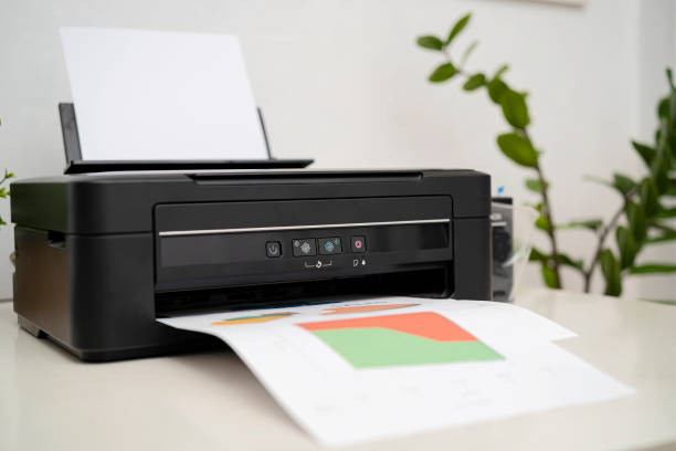 Printer, copier, scanner, workplace. Small printer for use and printing at home stock photo