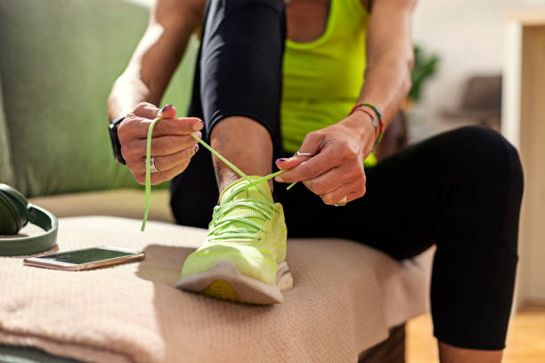 istock Athletic woman getting ready for a jogging 1352250355
