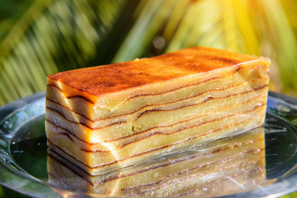 Bebinka on platter, close-up. Bibik, a national dessert in Goa, India. Multi-layer sweet pudding based on coconut milk