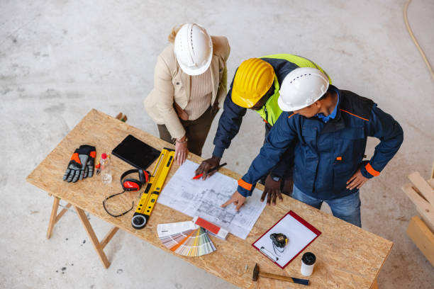 istock Architect, Business Manager and Civil Engineer Meeting Project At Planning Desk 1352256183
