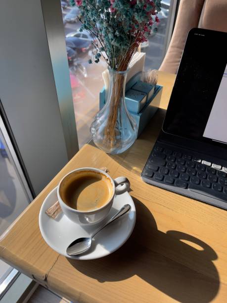 istock cup of coffee and laptop 1352256357