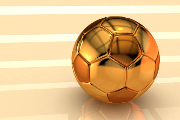 istock 3d soccer ball made of gold on a beige yellow background 1352257489