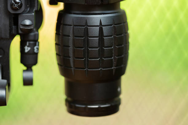 istock Close-up parts of automatic weapon with selective focus and blurred background 1352262734