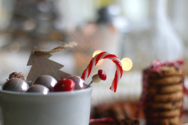 istock Cookies, Cinnamon, Book and Candles 1352264526